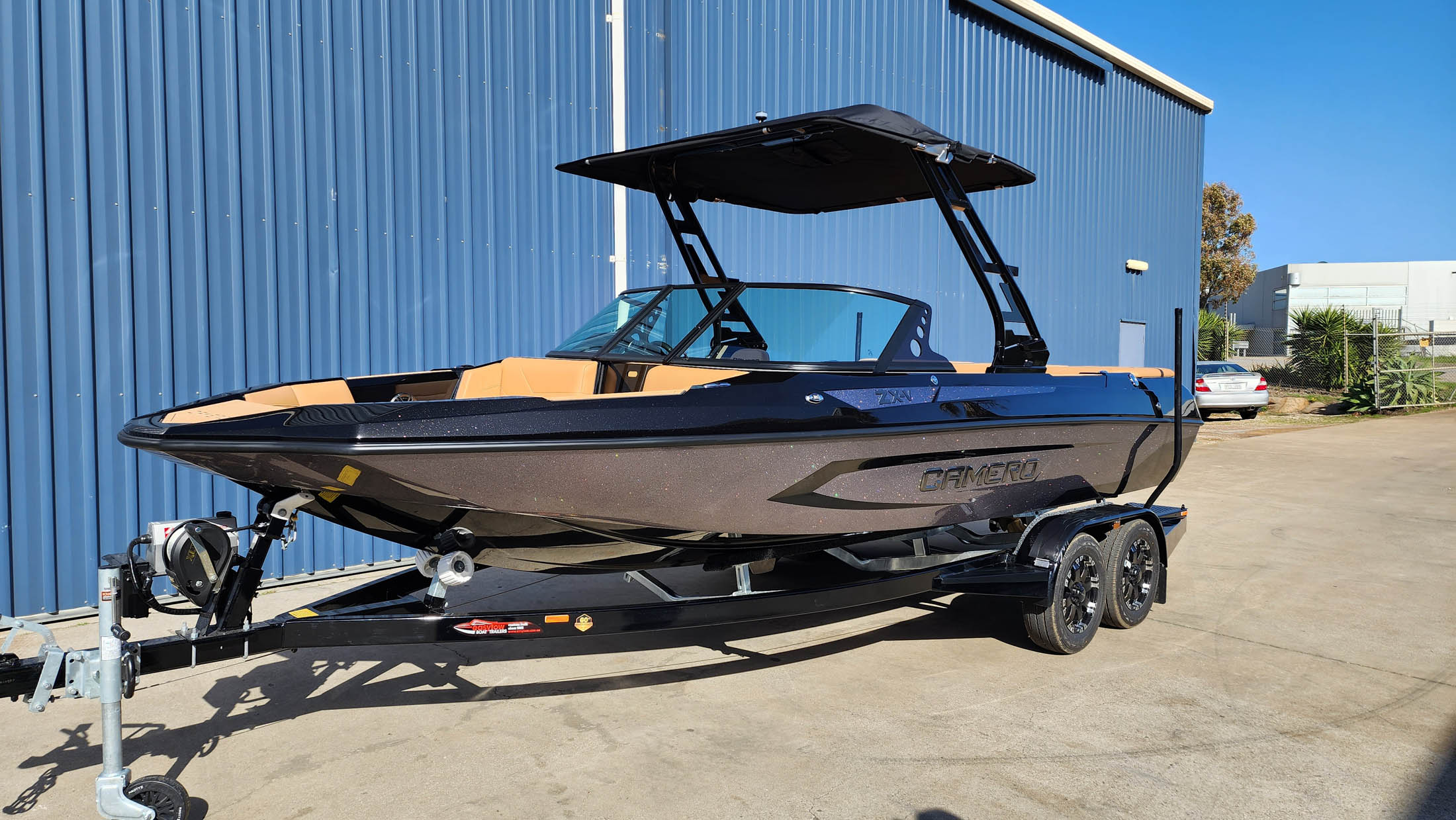 Camero ski and wake boat on the water